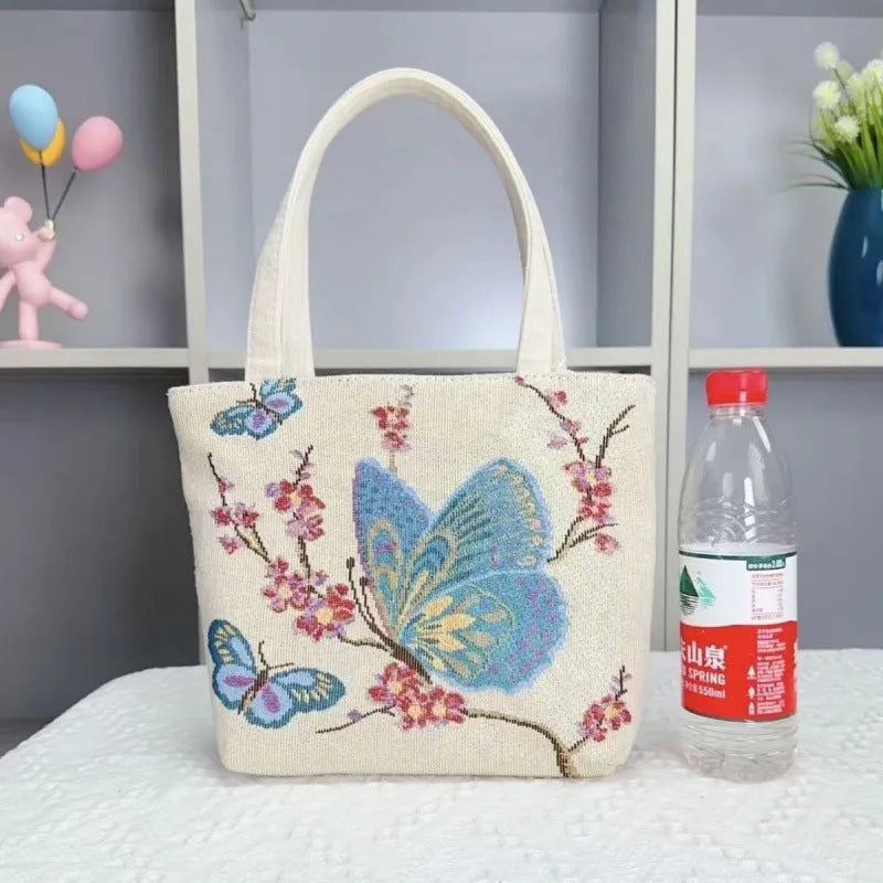 Double-sided gold wire embroidered canvas tote bag showing Bunny design with reinforced base