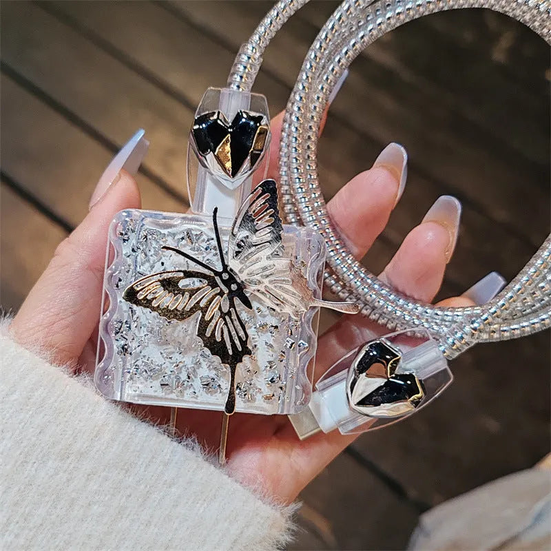 Three-dimensional butterfly USB cable protection sleeve in silver foil for data cable organisation