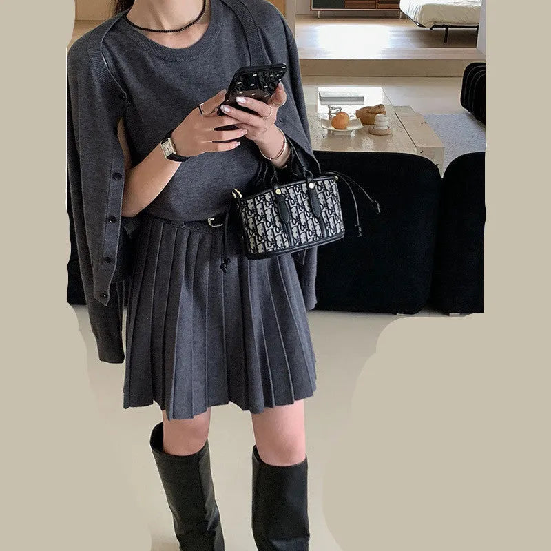 Women's grey knitted vest skirt and cardigan two-piece set with 3D pattern