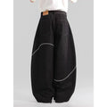 Black straight-leg denim trousers with a mid-waist and zip fly, laid flat.