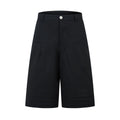 Retro wide leg straight cut denim middle pants in black and green colours showing loose fit and fifth pants length