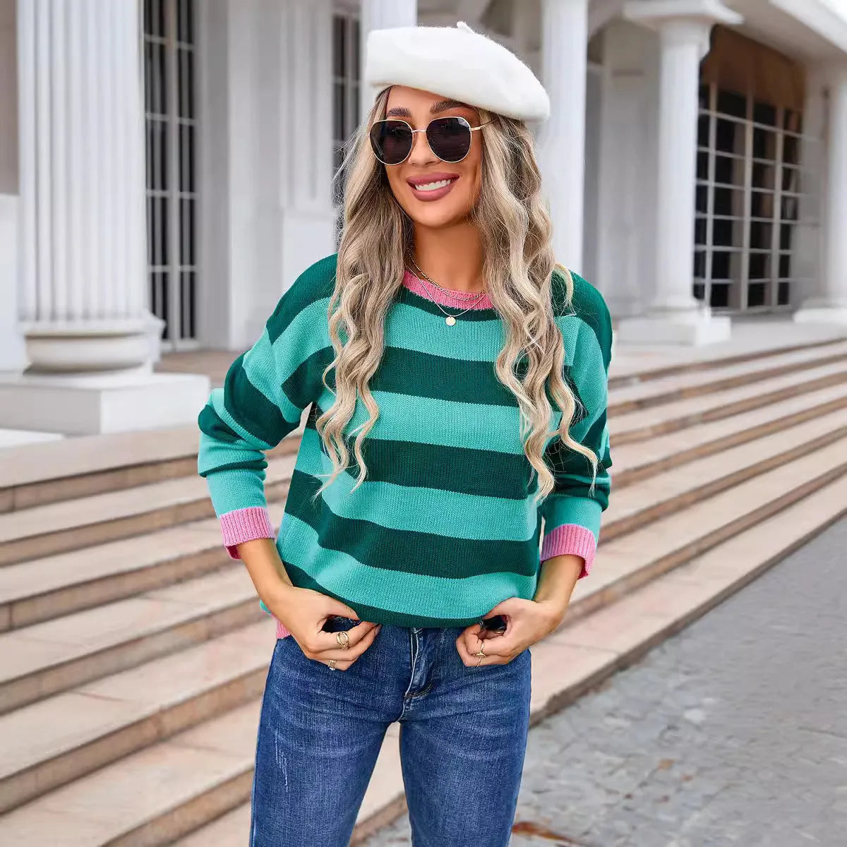 Women's loose striped acrylic sweater in blue colour with round neckline and long sleeves