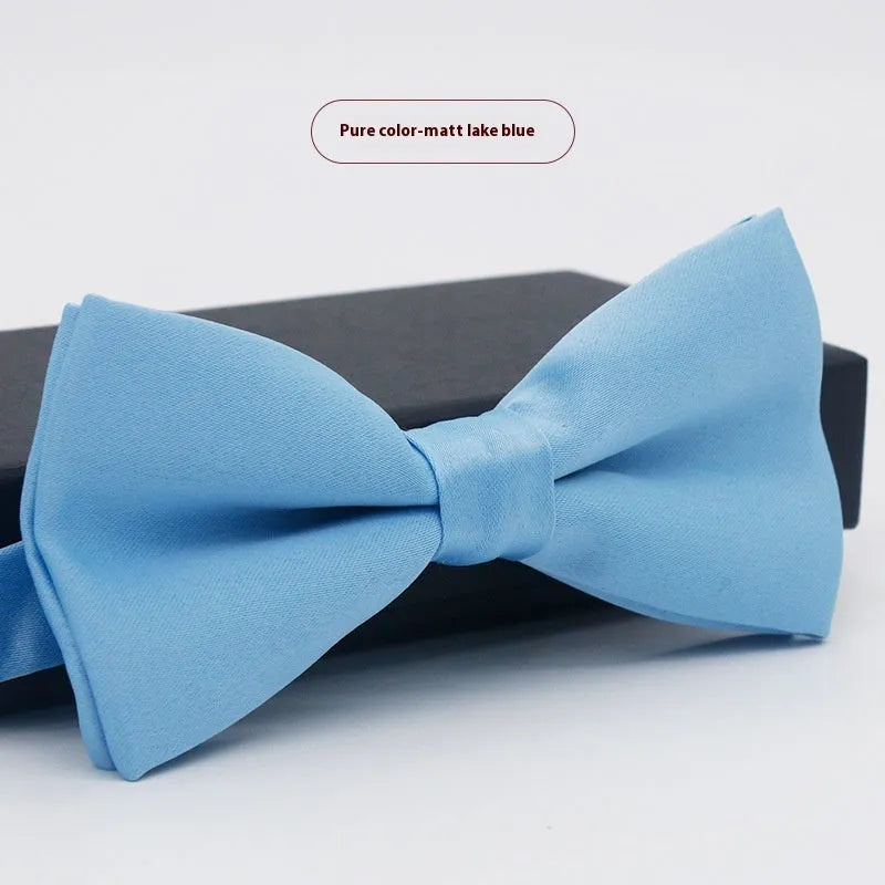 Solid colour polyester bow tie with flat head design measuring 12cm by 6cm