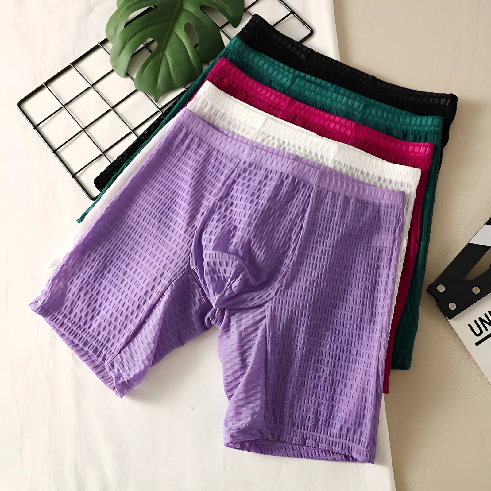 Men's solid colour lace boxer shorts with hip-lifting shaping design
