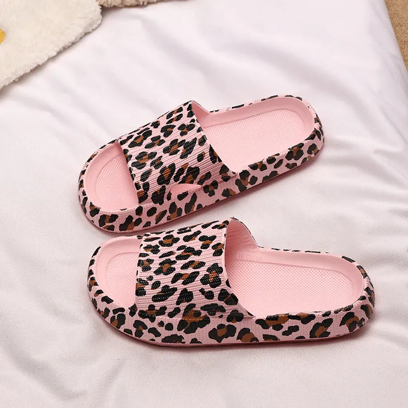 Women's leopard print EVA slippers with thick sole on a white background.