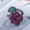 Women's black gold geometric flower personality ring with simulated red corundum stone