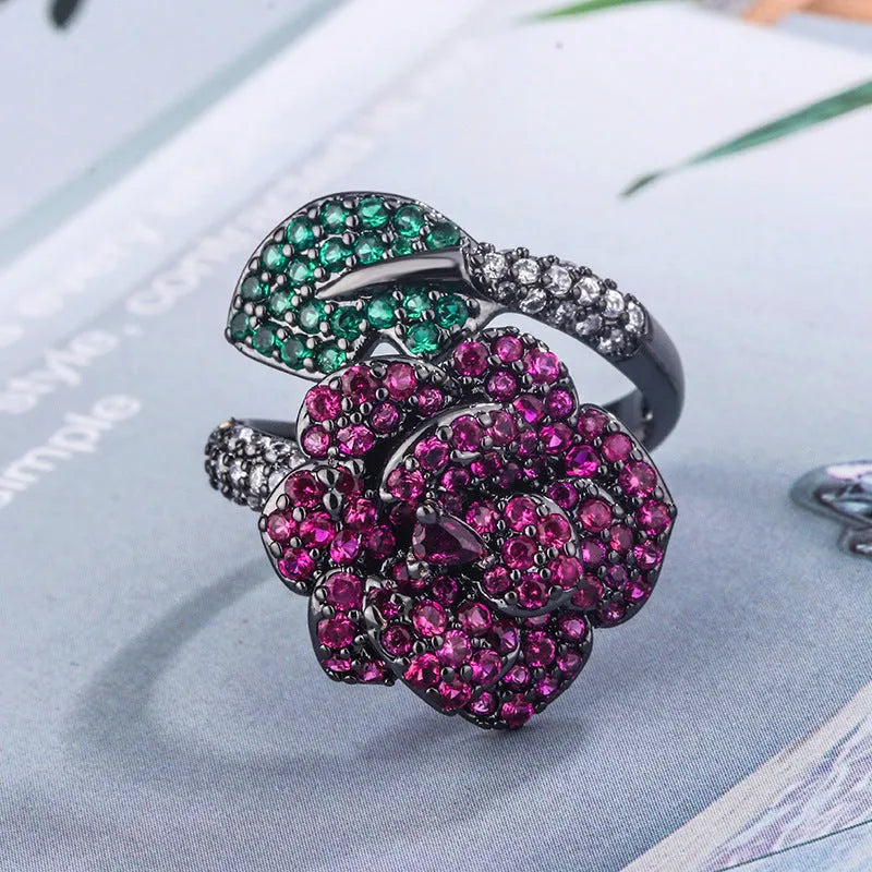 Women's black gold geometric flower personality ring with simulated red corundum stone
