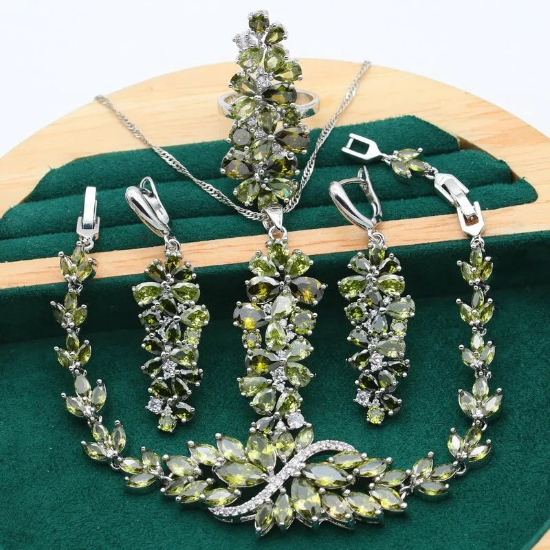 Retro floral pattern jewellery set with necklace, earrings, ring, and bracelet in olive or purple colours