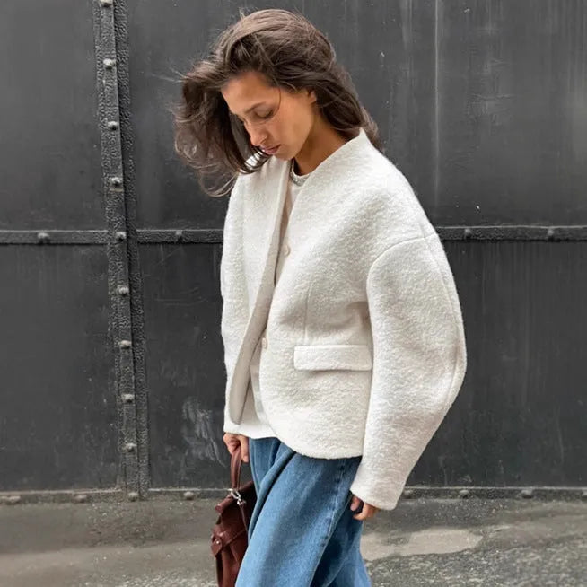 Women's coarse woolen thick polyester coat in solid white with raglan sleeves and stitching details