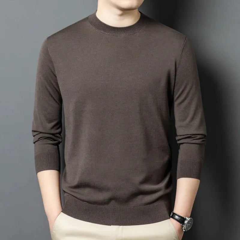 Men's round neck long sleeve wool sweater in a pullover style for winter.