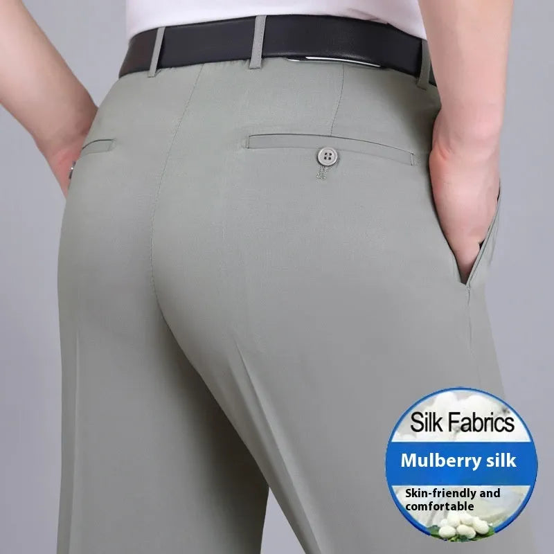 Men's straight leg formal trousers in a dark blue colour, showcasing the high waist and non-iron fabric blend.