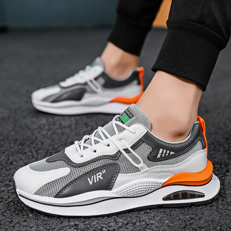 Men's grey breathable mesh running shoes with EVA sole and round toe design