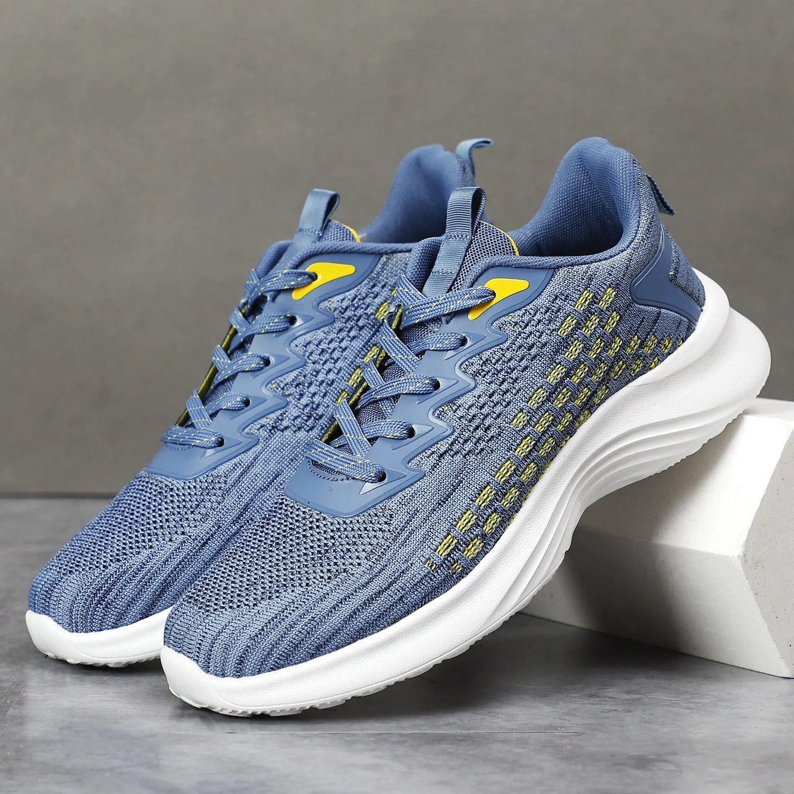 Lavender purple women's Flyknit running shoes with striped pattern, mesh lining, and a flat EVA wedge sole.