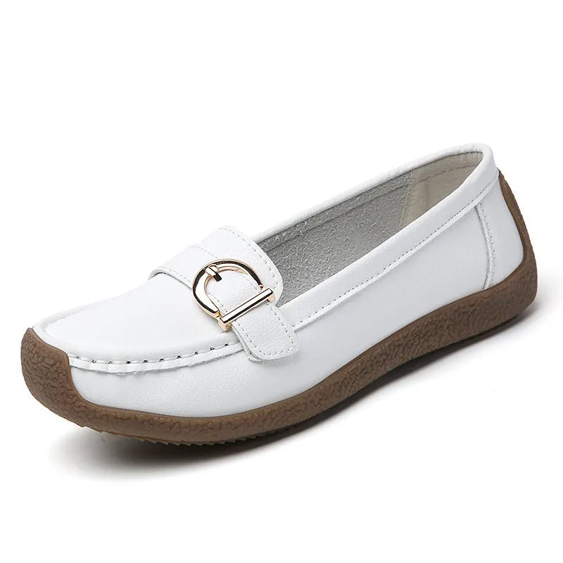 Women's beige casual loafers with a round toe and shallow slip-on design on a soft beef tendon sole.