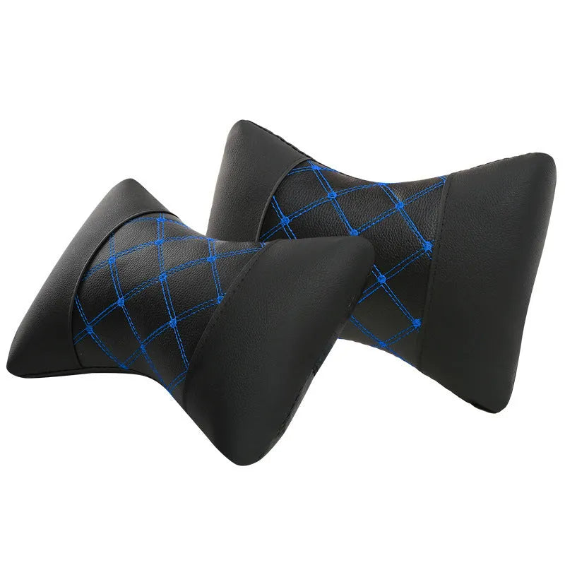 Black leather quilted car headrest neck pillow with diamond pattern and contrast stitching.