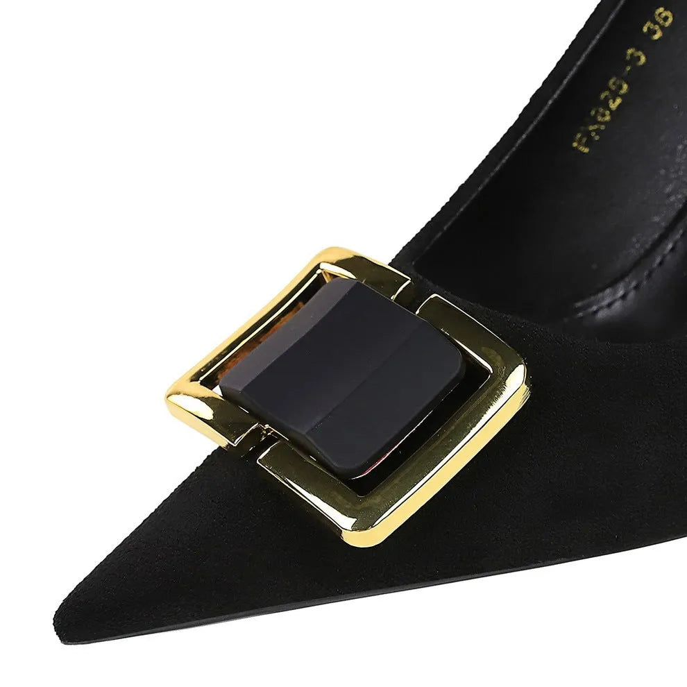 Black suede women's stiletto high heels with 9cm heel and shallow open toe on a neutral background