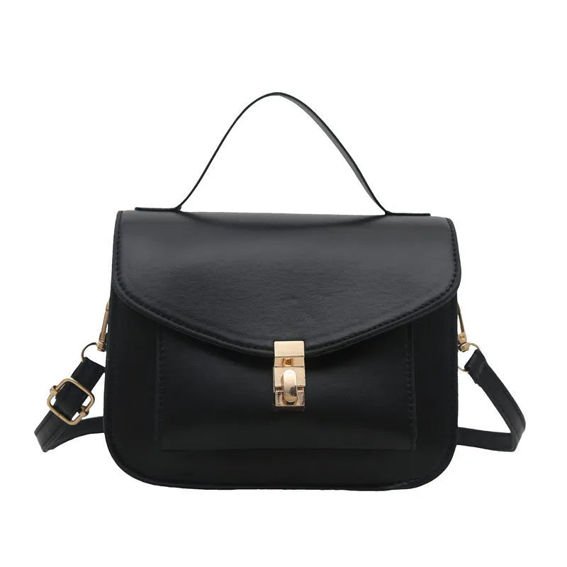 Retro style shoulder messenger bag in horizontal square shape with crossbody strap