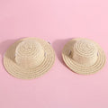 Handmade paper pet hat with bowknot for a dog or cat, shown in a cartoon style
