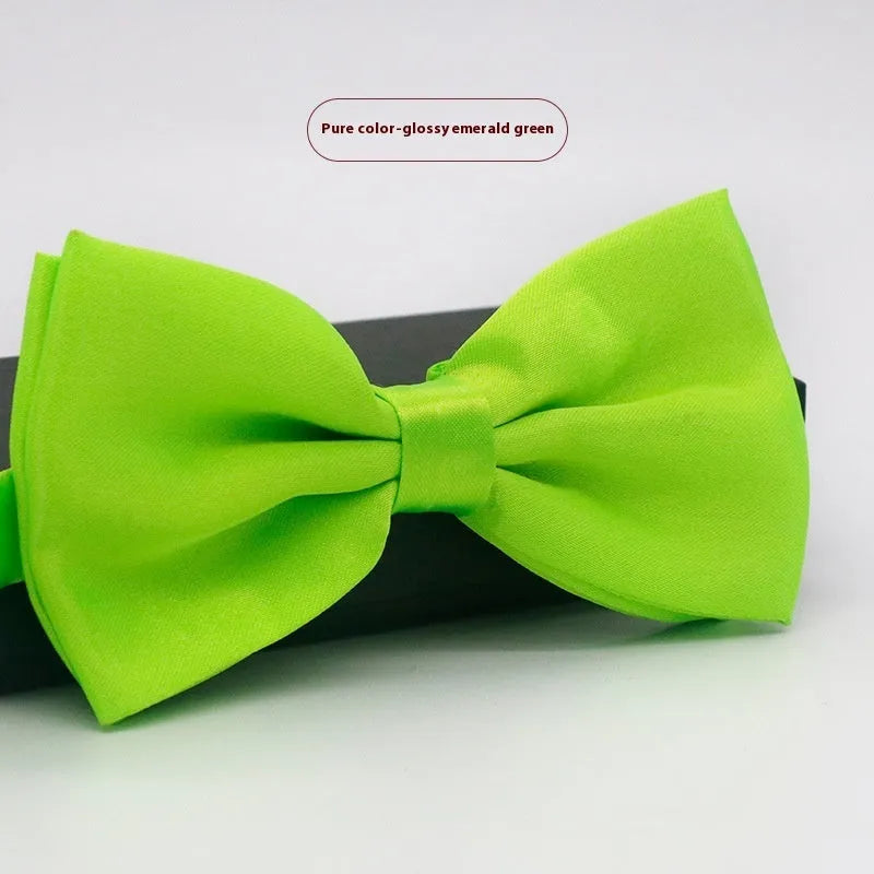 Solid colour polyester bow tie with flat head design measuring 12cm by 6cm