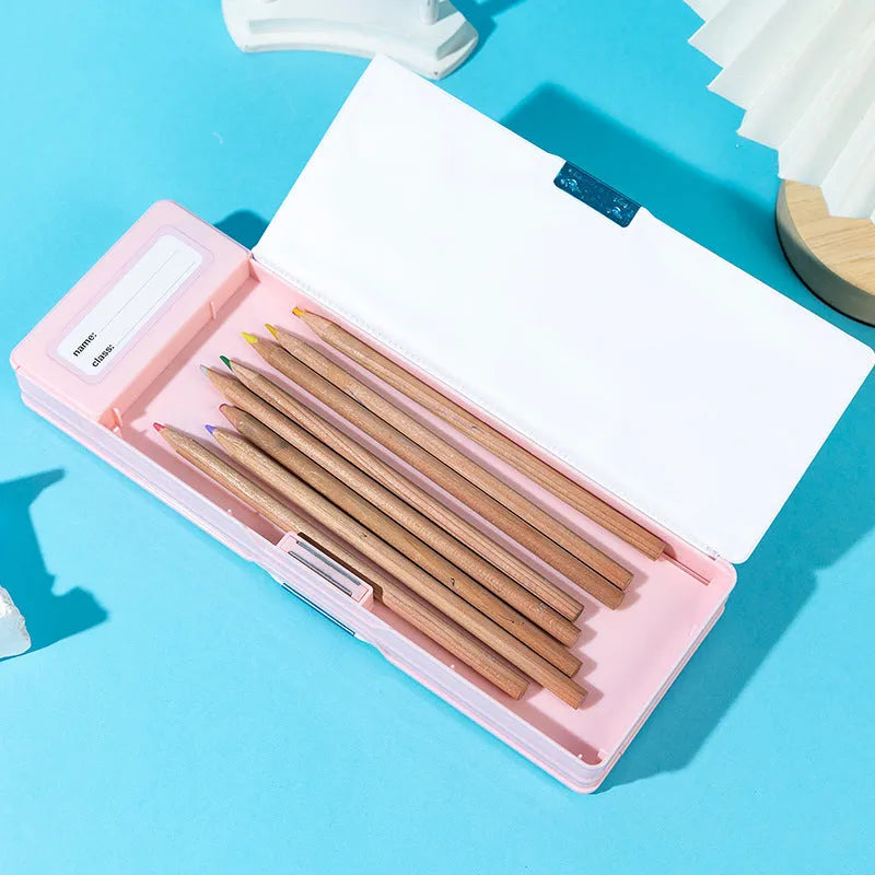 Multifunctional plastic pencil box with calculator in pink colour, double-sided opening