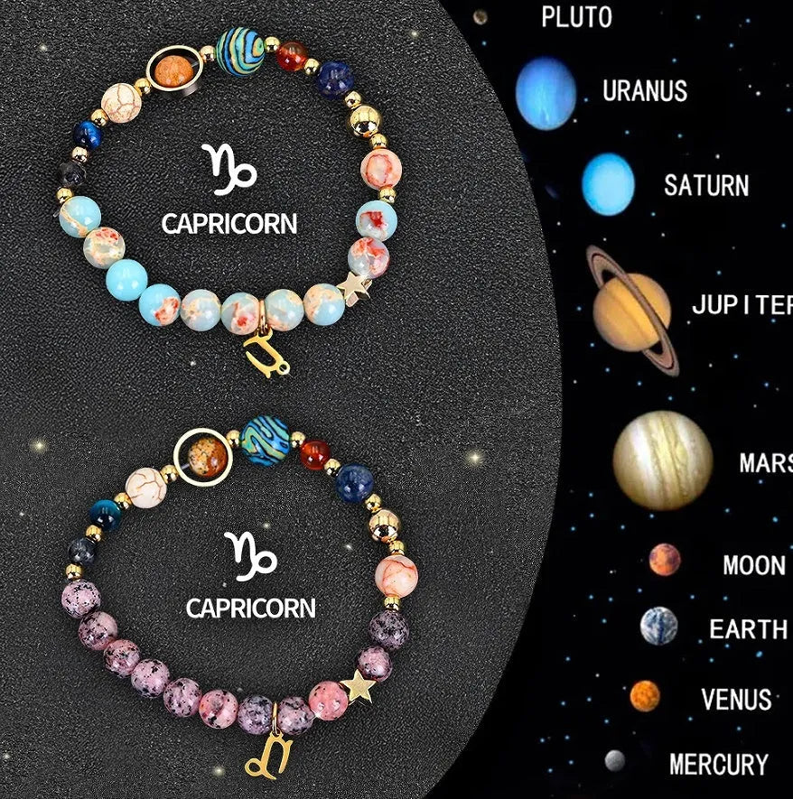 Set of two natural stone beaded bracelets showing zodiac sign designs on elasticated cords