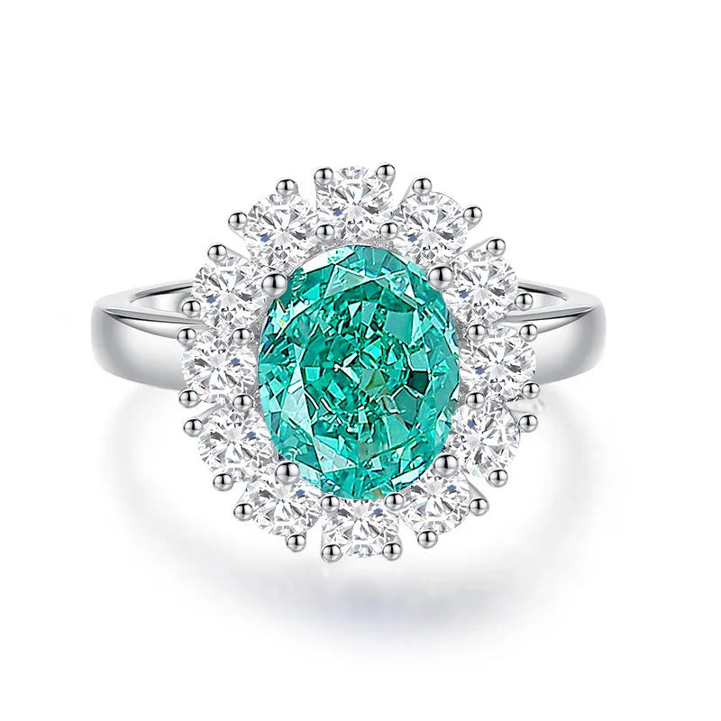 S925 sterling silver ring for women with a green emerald stone set using Palaibahao inlay and diamond accents.