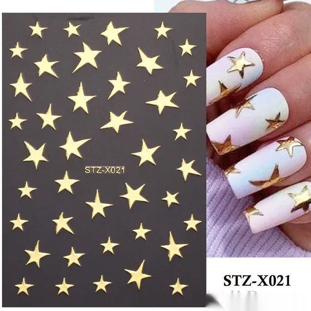 Sheet of black and silver strip nail art stickers with cartoon and love heart designs