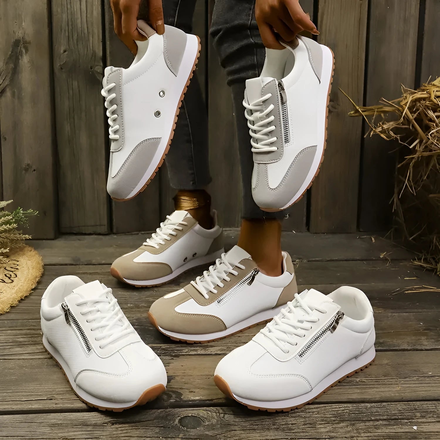 Women's grey flat-heeled shoes with artificial PU upper and rubber sole on a plain background.