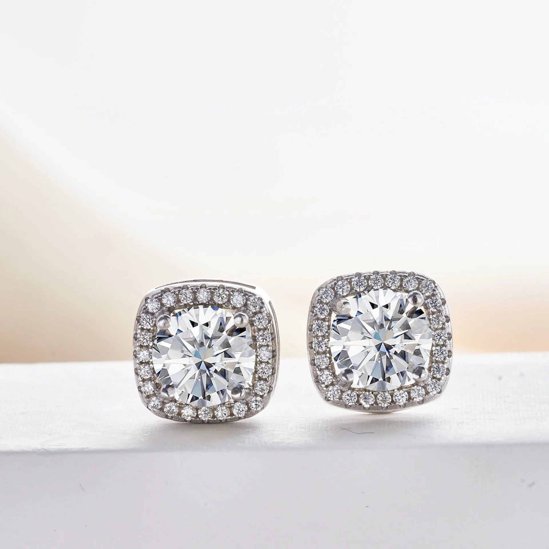 Micro inlaid moissanite stud earrings in S925 sterling silver with round natural stones, unisex design, 1CT per pair
