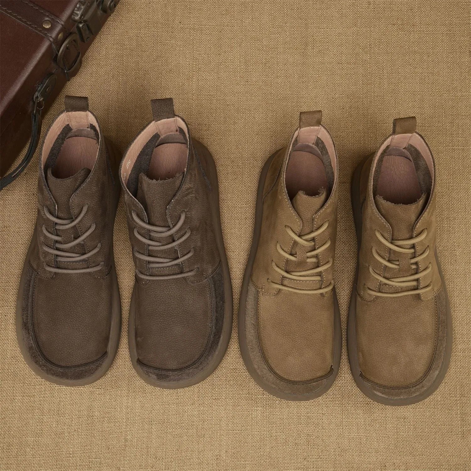 Women's grey genuine leather Martin boots with wedge heel and lace-up front.
