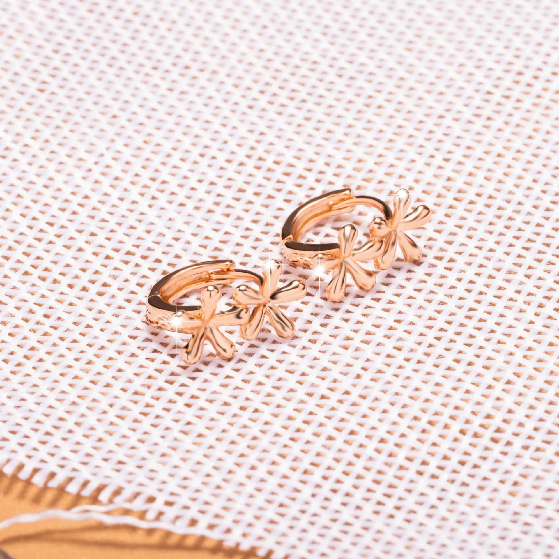 Rose gold electroplated waterdrop flower earrings with circular European style design for women