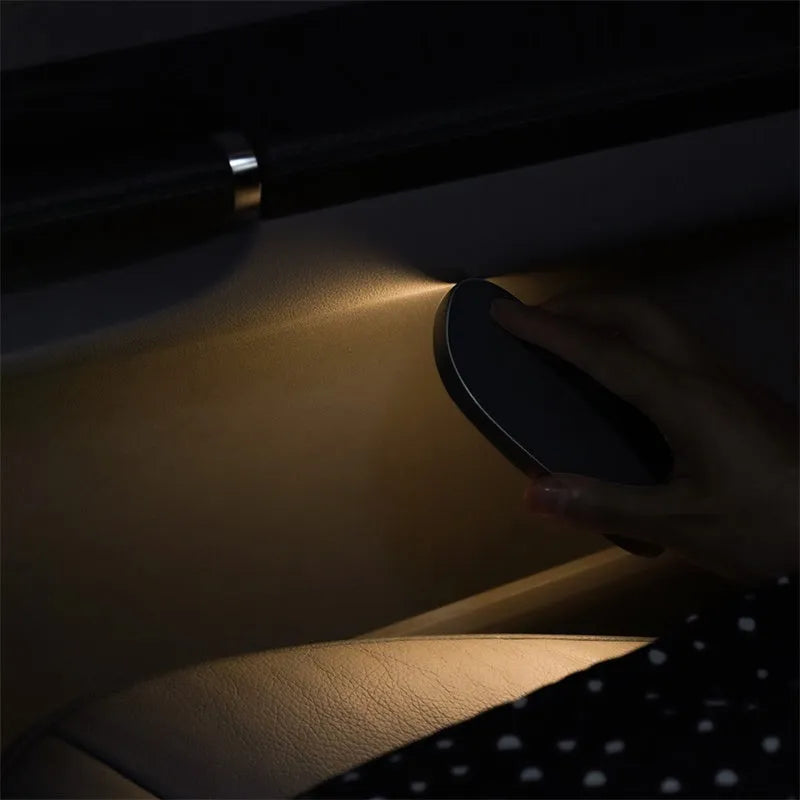 LED car reading light in black, USB rechargeable with 400mAh battery, two brightness gears, compact design