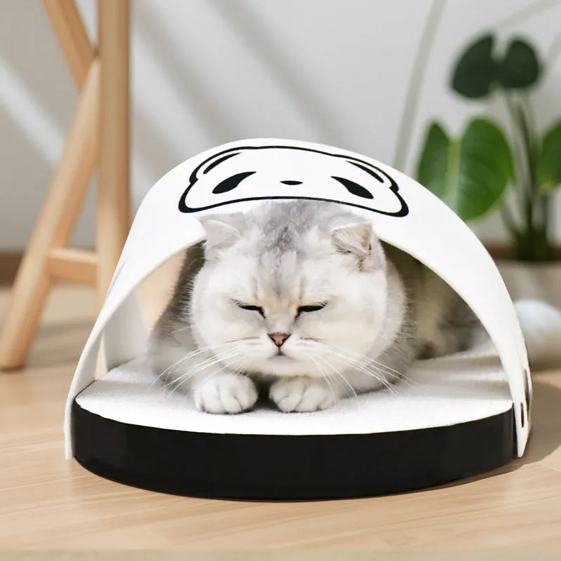 White corrugated paper cat scratch board in slipper style design on flat surface