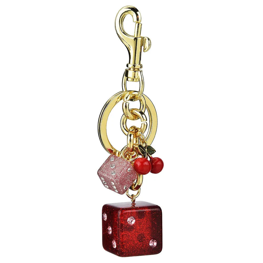 Square metal dice keychain pendant with cherry two-tone electroplated finish on a keyring