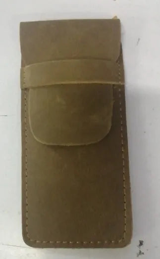 Brown leather pencil case with zip opening on a plain background