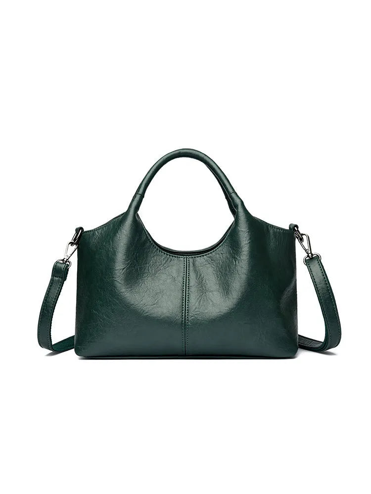 Genuine leather women's cross-body bag in multiple colours showing large capacity design