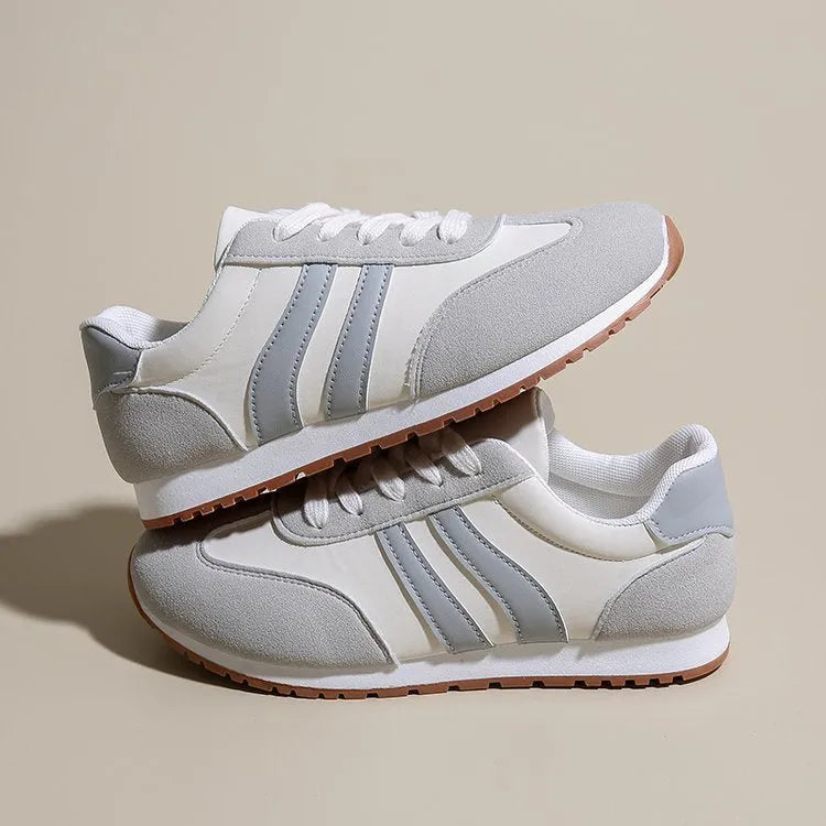 Blue and grey stripe sports shoes with rubber soles and round toe design