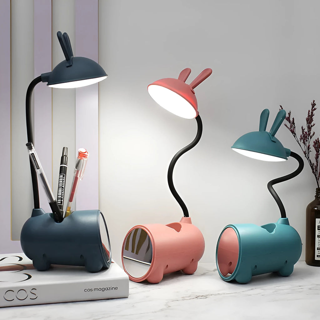 Cartoon-style desktop table lamp with pen container in green, dark blue, or pink colours