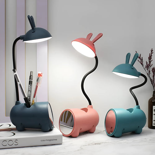 Cartoon-style desktop table lamp with pen container in green, dark blue, or pink colours