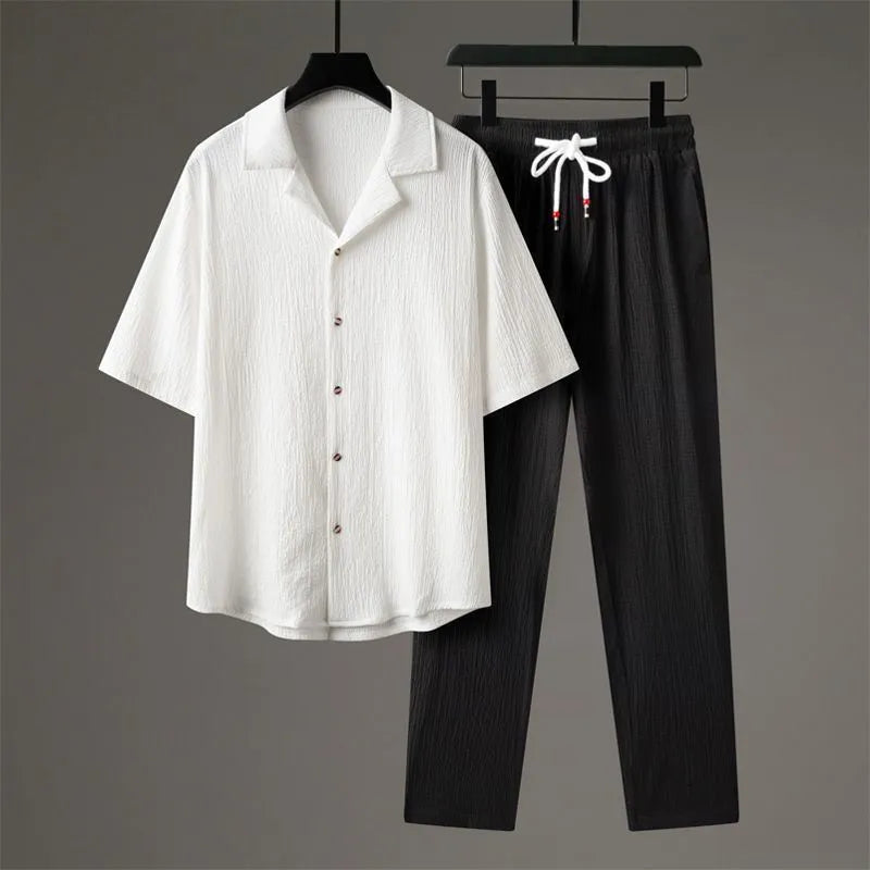 Men's national style two-piece sportswear set showing knitted half-sleeve top and full-length trousers