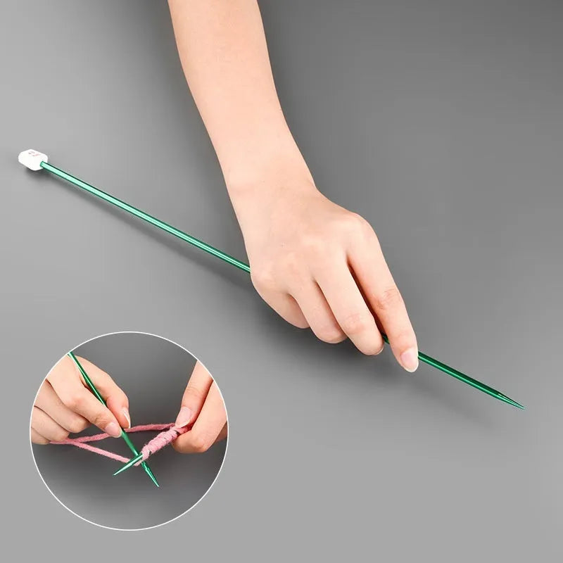 Set of lengthened crochet hooks with caps in 13 sizes from 2.0mm to 10.0mm, two hooks per size.