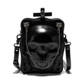 Black mini square crossbody bag with skull embroidery, decorative stitching, and metal chain details