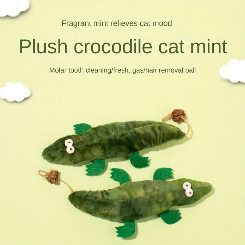 Green plush alligator catnip toy with peppermint scent for feline oral care and play