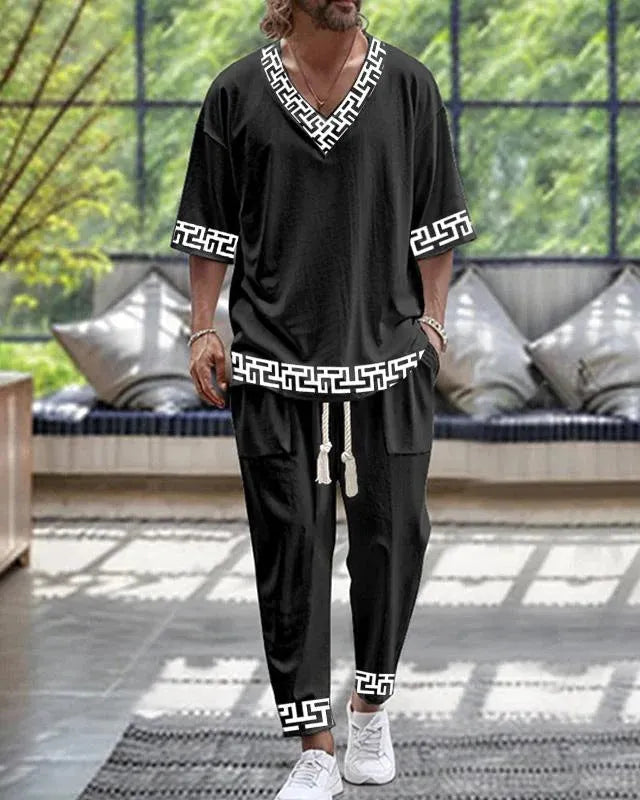 Man's thin polyester tracksuit set with V-neck cropped sleeve jacket and matching trousers