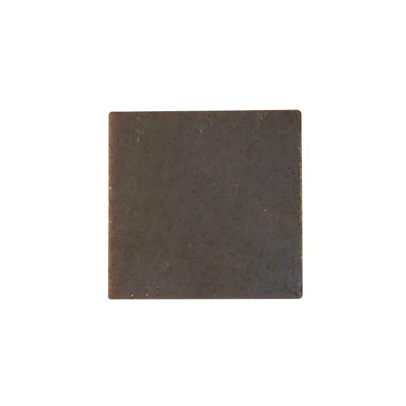 A single 72-gram bar of nine herb cold process shampoo soap for oil-free hair washing.