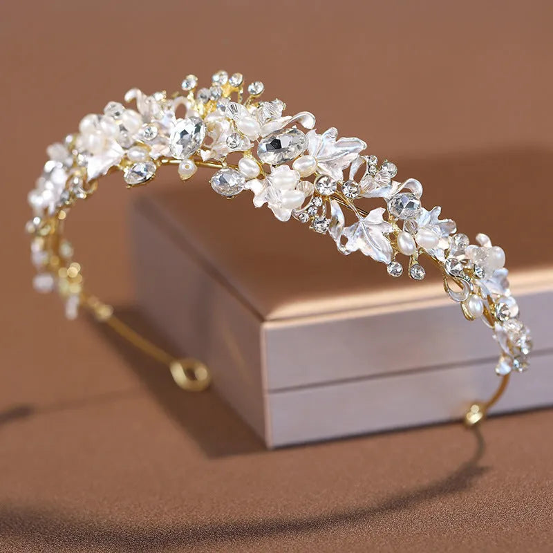 Pearl-decorated alloy crown headdress hair accessory in a gold electroplated finish.