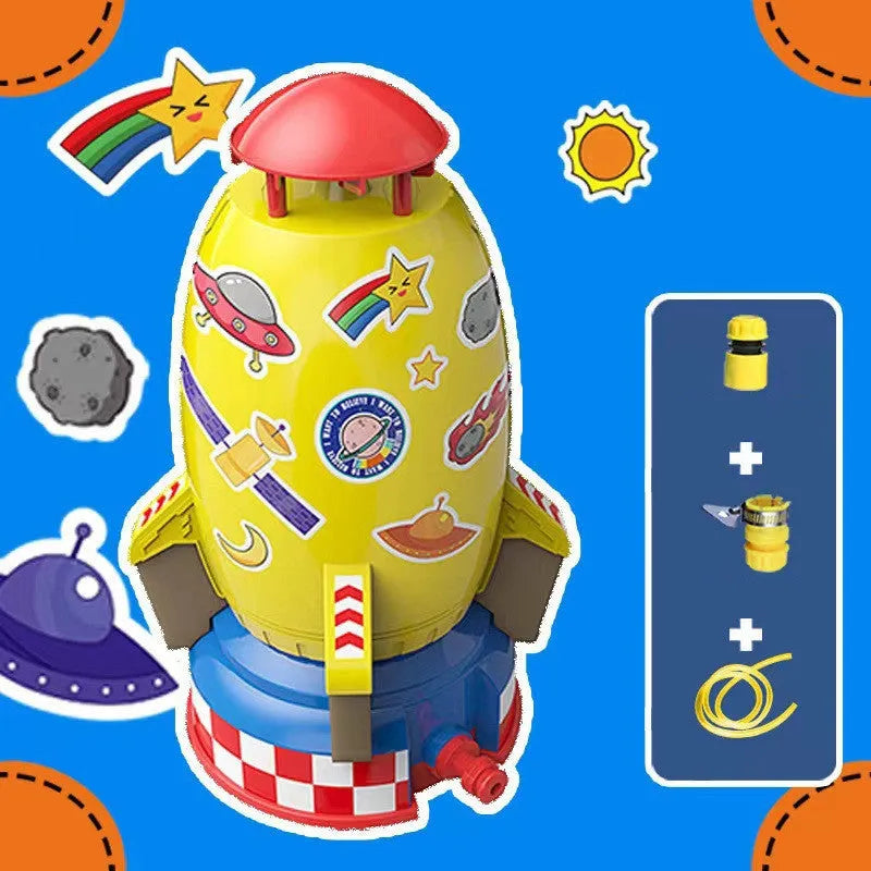 Water pressure rocket launcher toy on green grass with water spray, yellow rocket, and base connector