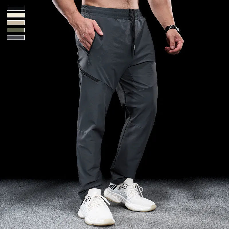 Men's waterproof workout pants in quick-drying nylon fabric for sports and fitness activities