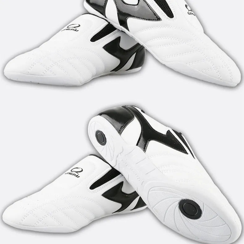 Black and white PU Taekwondo martial arts training shoes with a soft sole.