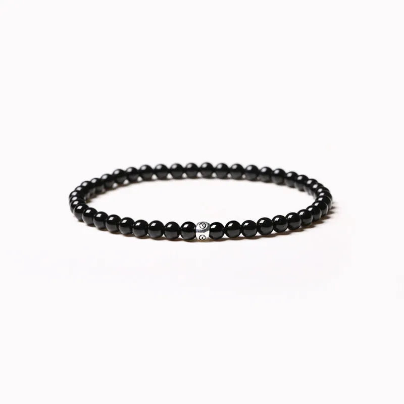 Geometric agate bracelet with 4mm beads in black, blue, and obsidian colours